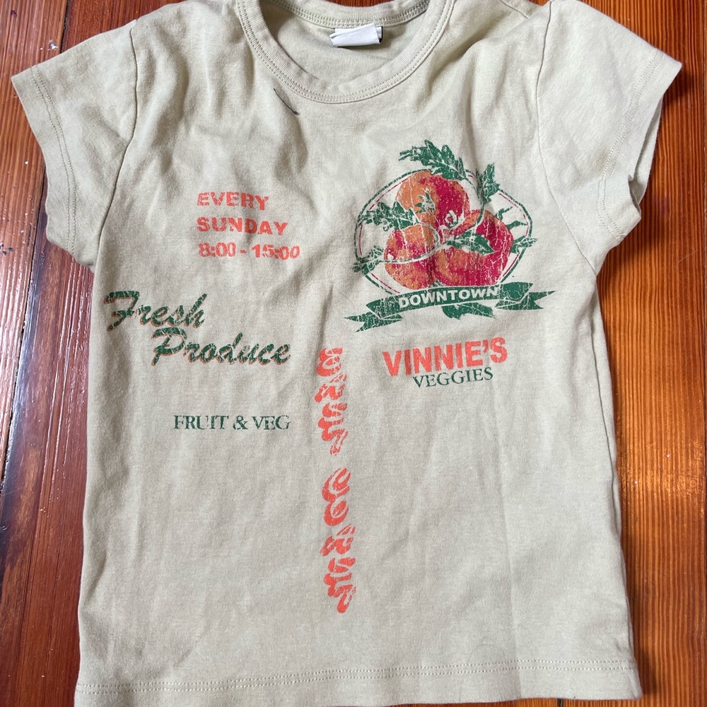 Green graphic baby tee